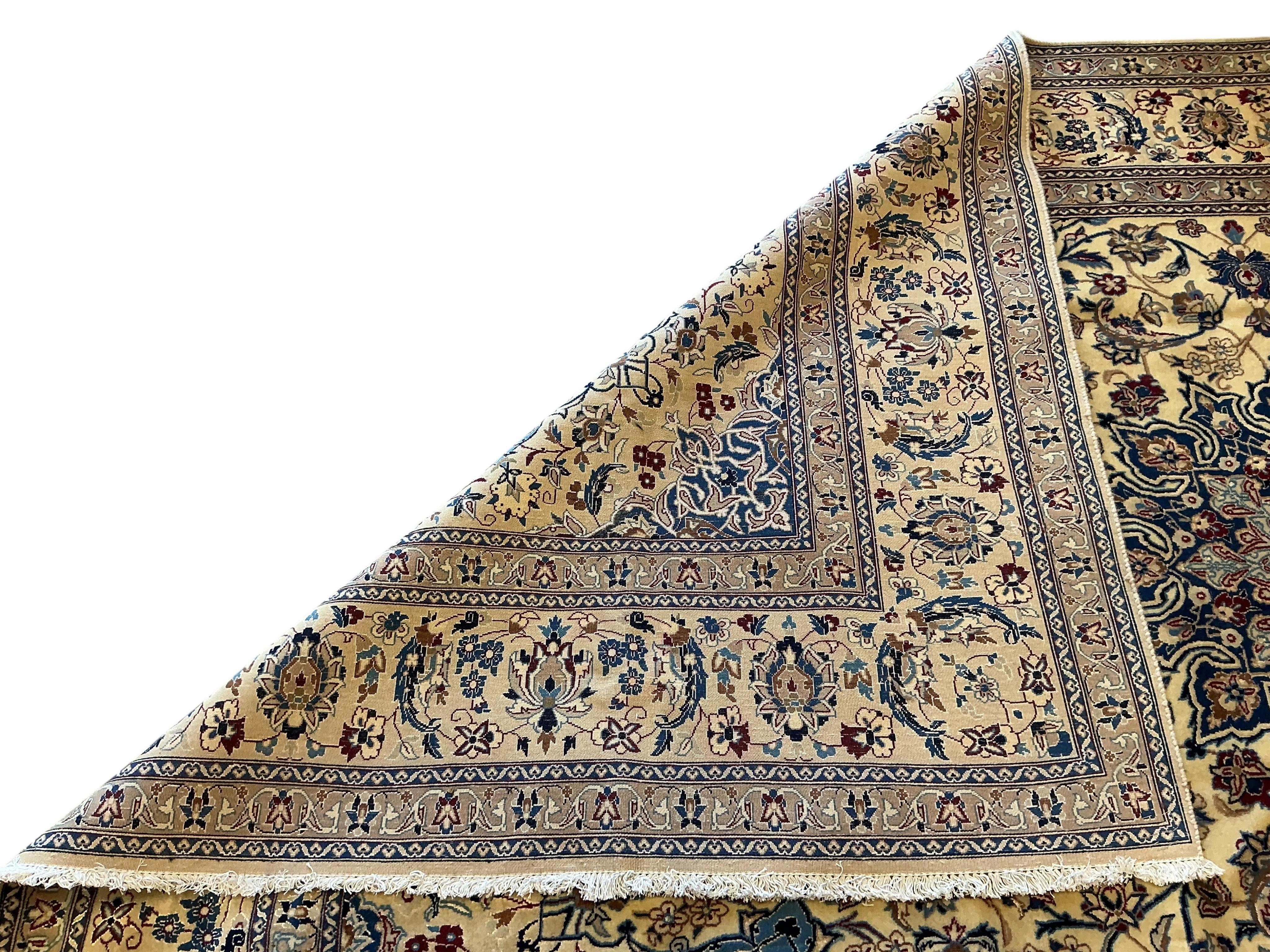 A Nain ivory ground carpet, 341 x 200cm